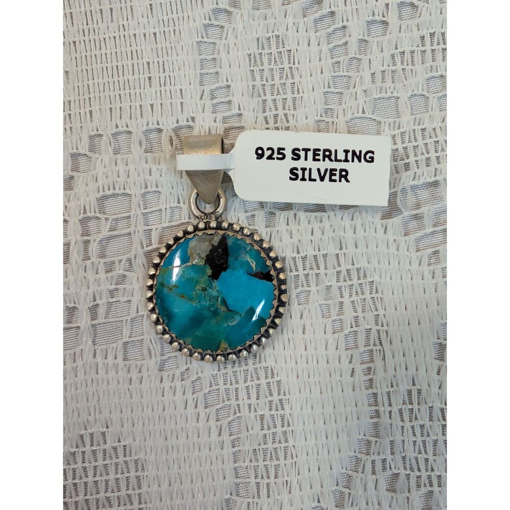 Collectible Black Jack Mohave Turquoise Sterling Silver Pendant